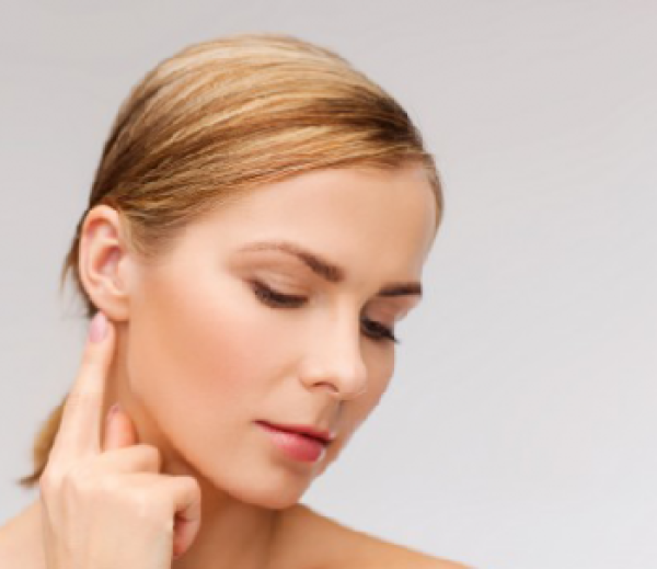 Is a growing mass under the earlobe important?